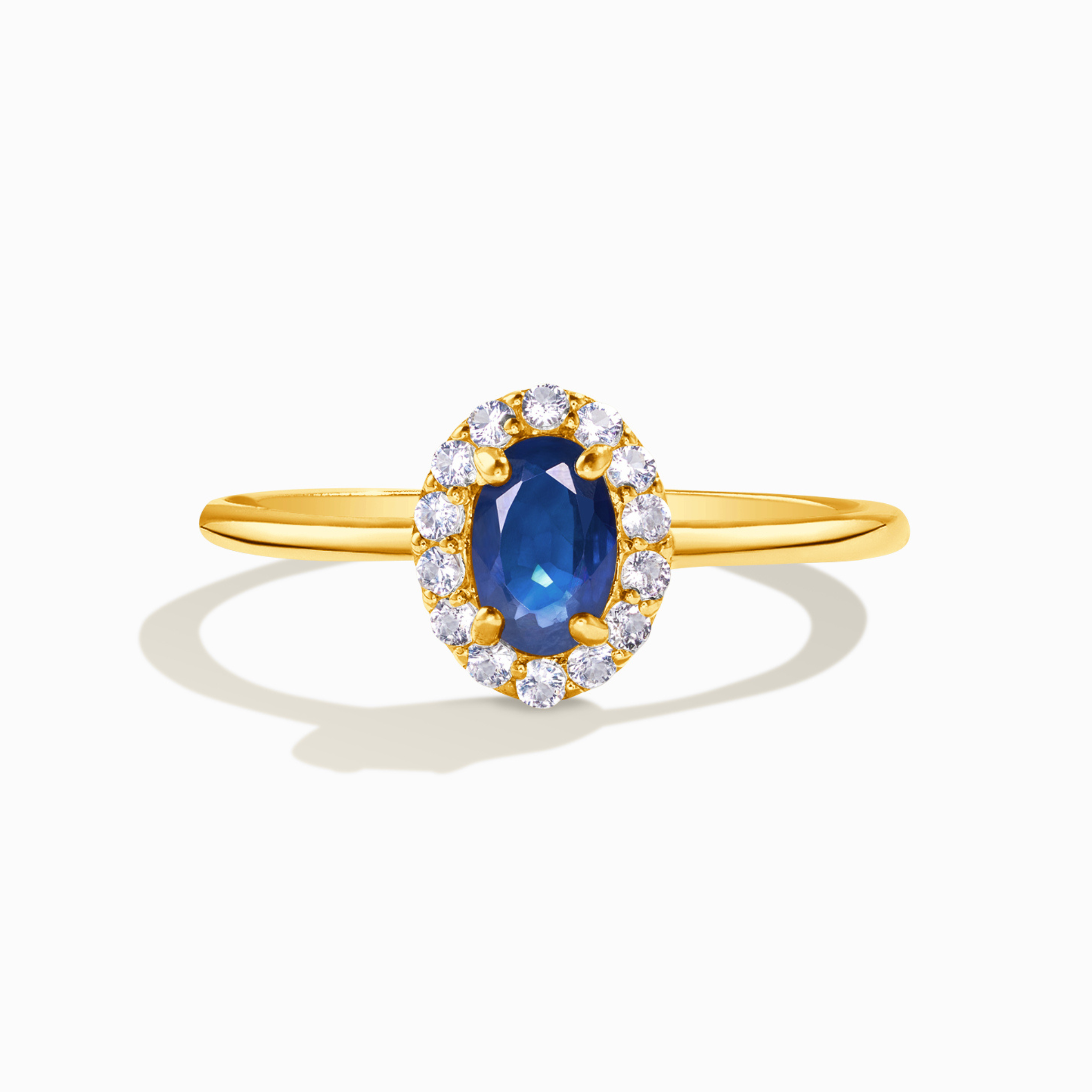 Blue sapphire ring in 18k gold vermeil on white background