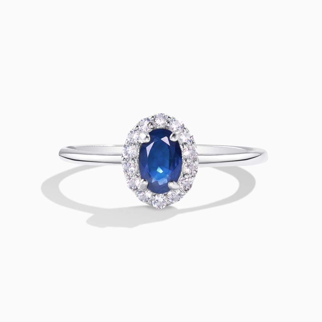 Blue sapphire ring in sterling silver on white background
