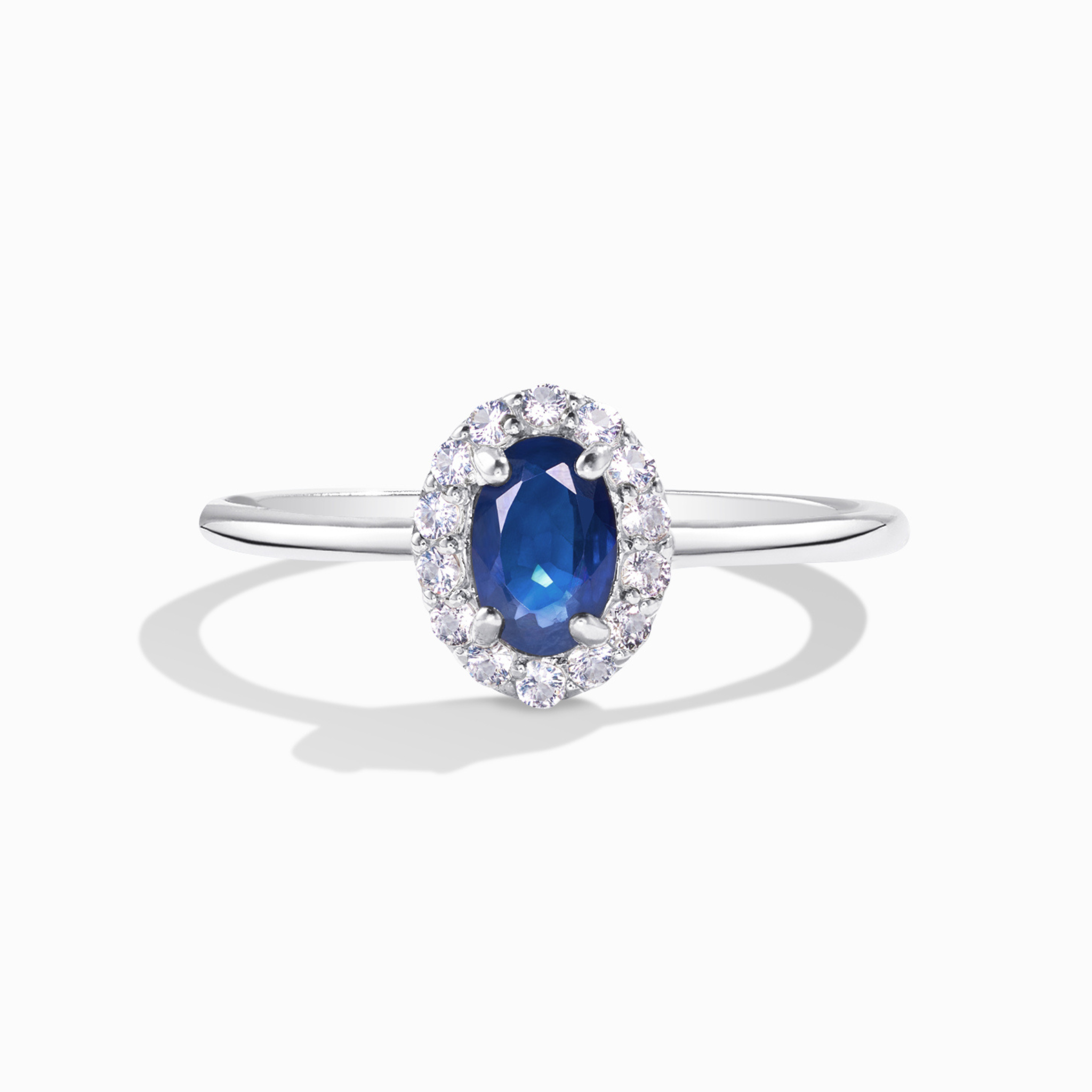 Blue sapphire ring in sterling silver on white background