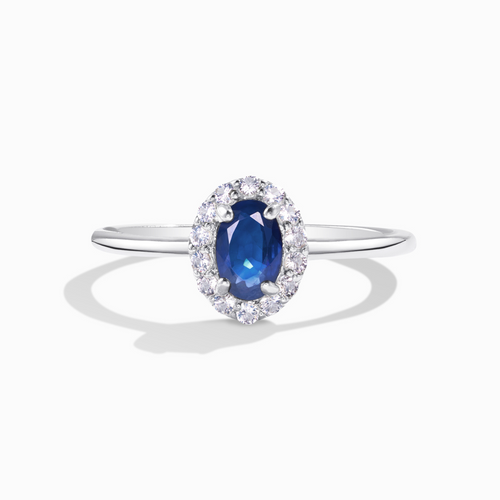 Blue sapphire ring in sterling silver on white background