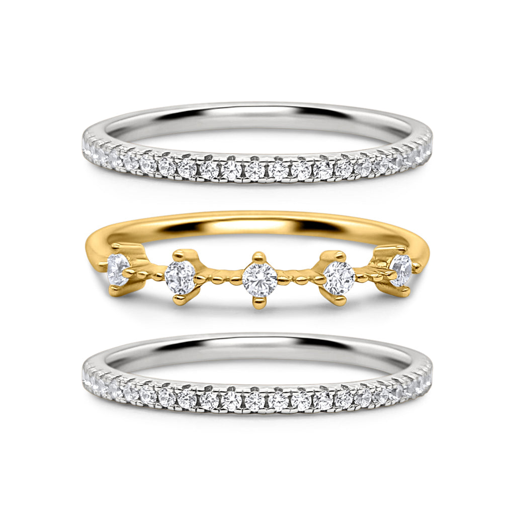 Celeste stacking ring set in silver and gold on white background