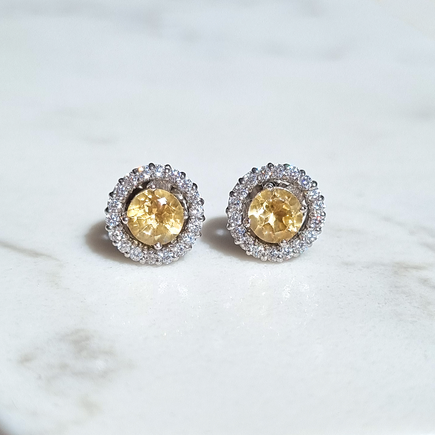 Citrine round halo stud earrings with jackets in sterling silver detail image