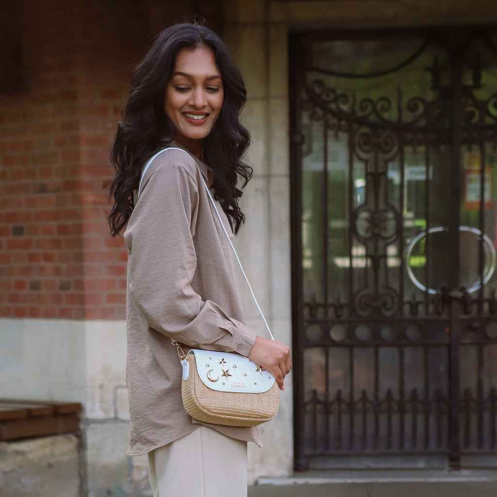 Luna Charles Elena white rattan handbag close-up with gold star studs