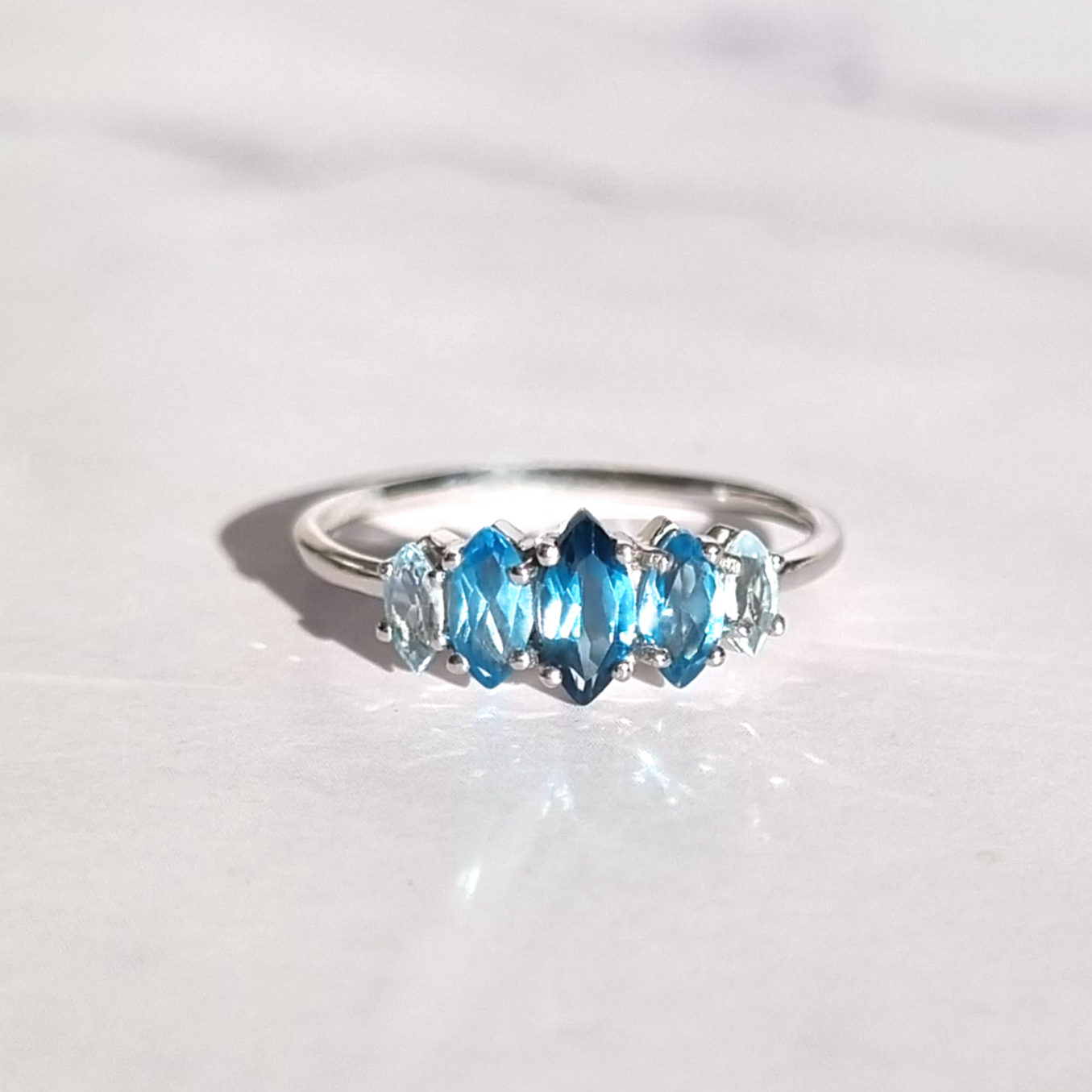 Ombre blue topaz ring in sterling silver product image