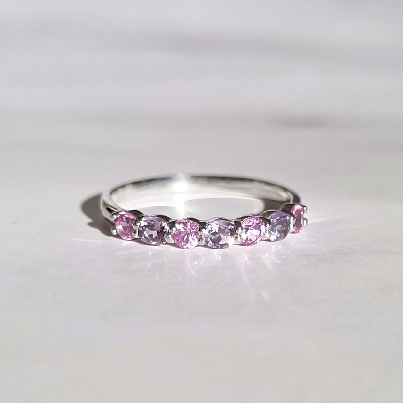 Pink sapphire and pink amethyst half eternity band in 18k rose gold vermeil product image