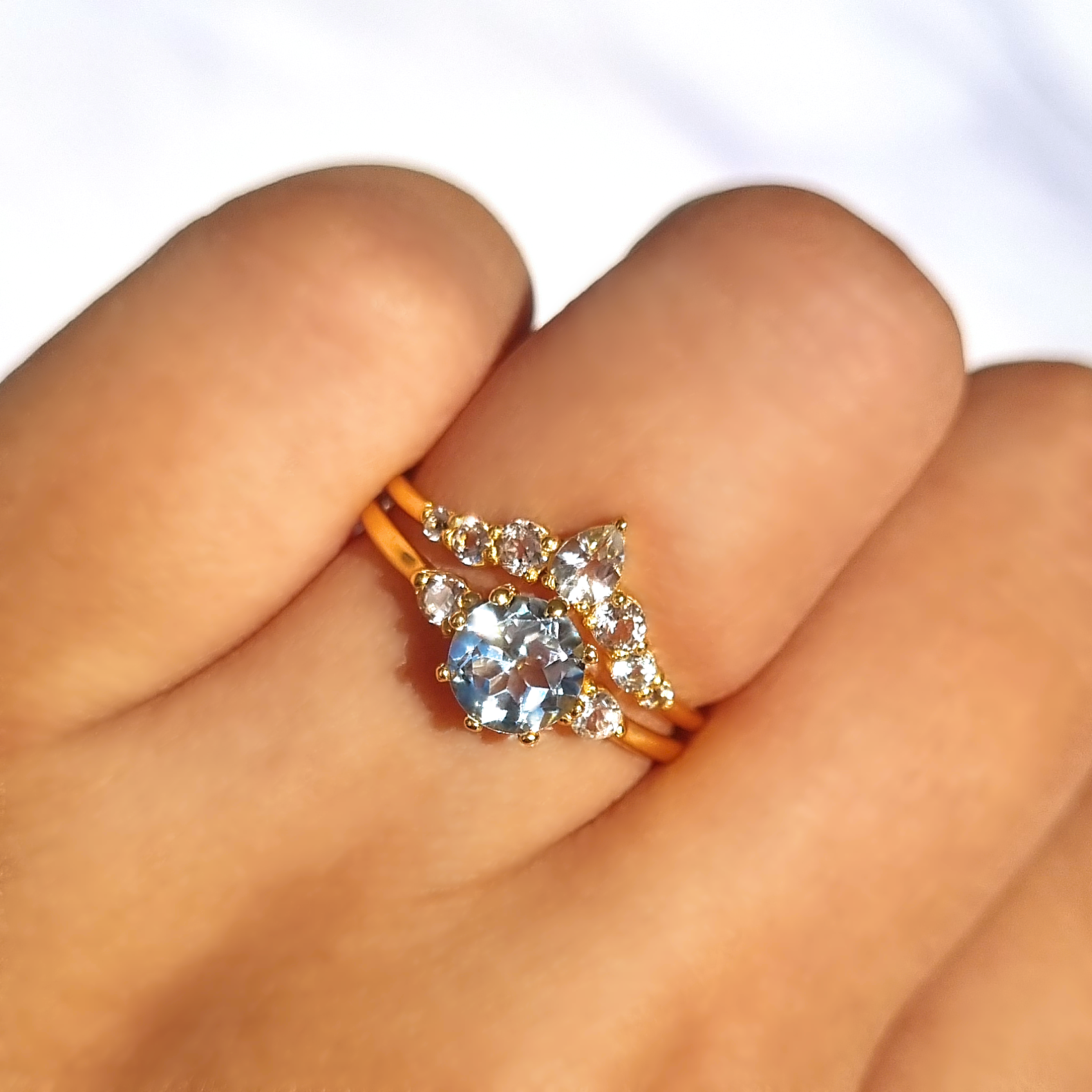 Selene sky blue topaz ring set in 18k gold vermeil on hand