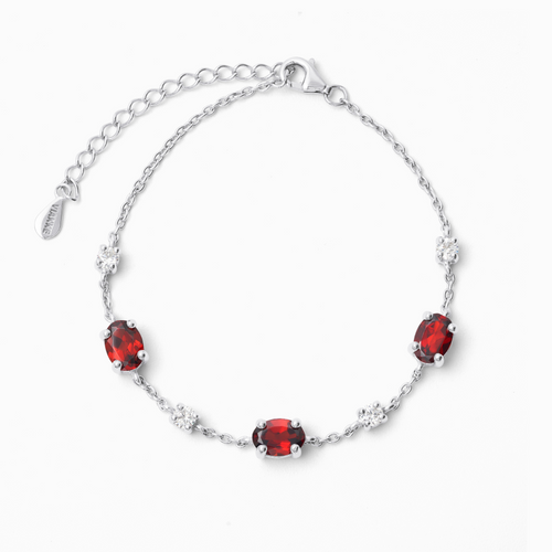 Garnet bracelet in sterling silver on white background
