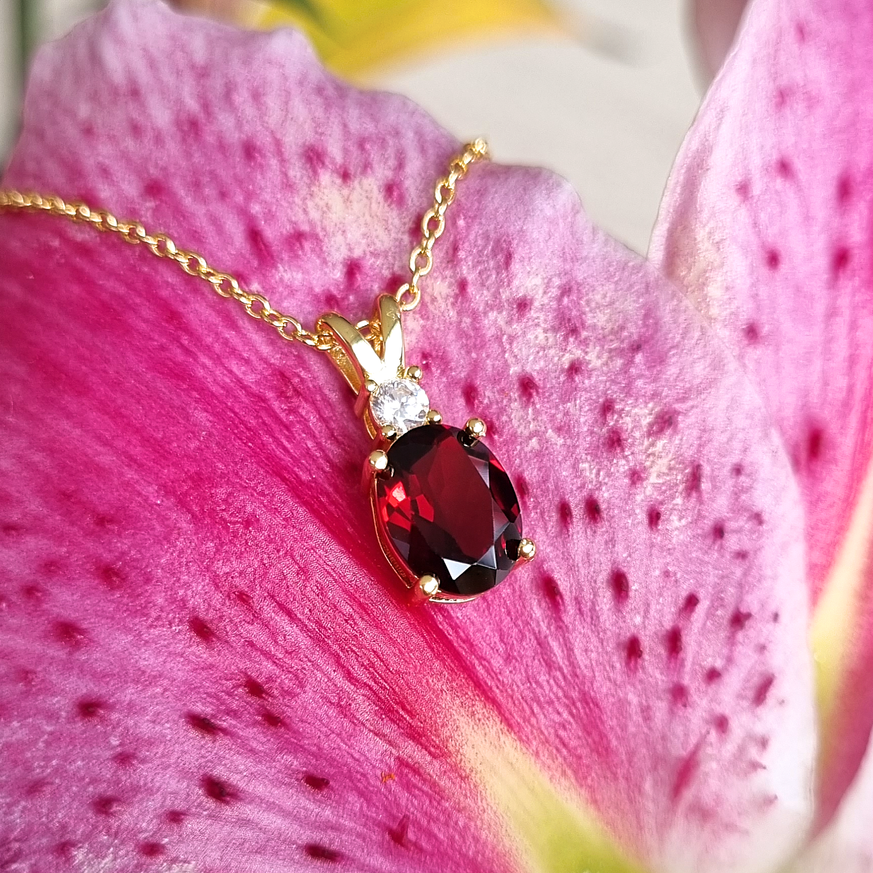 Garnet pendant necklace in 18k gold vermeil lifestyle detail image