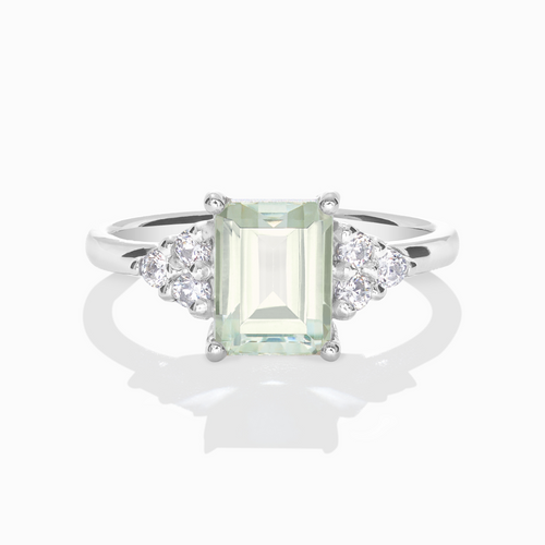 Green amethyst emerald cut ring in sterling silver on white background