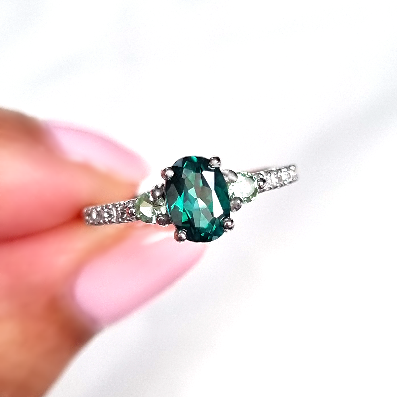 Green topaz and green tourmaline rings in sterling silver lifestyle image