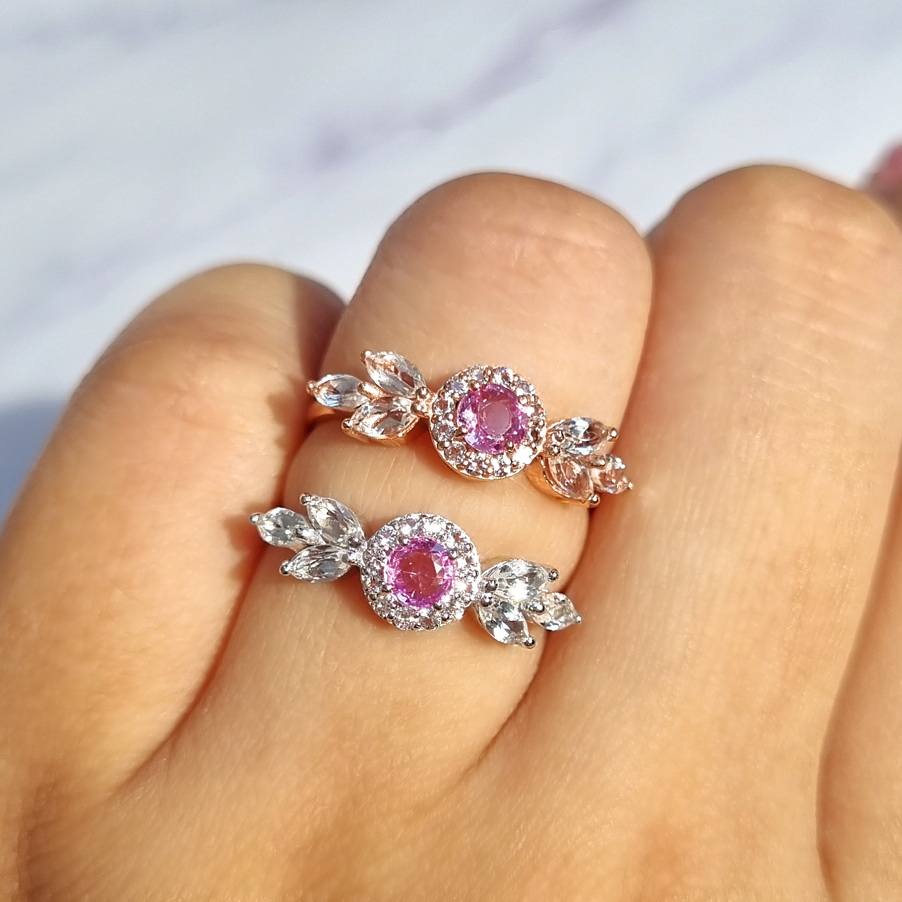 Aurelia pink sapphire rings in sterling silver and 18k rose gold vermeil on hand