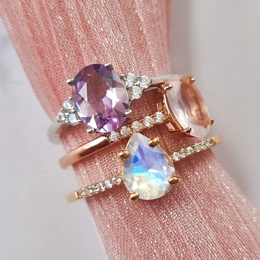 Gemstone rings group image with rainbow moonstone ring