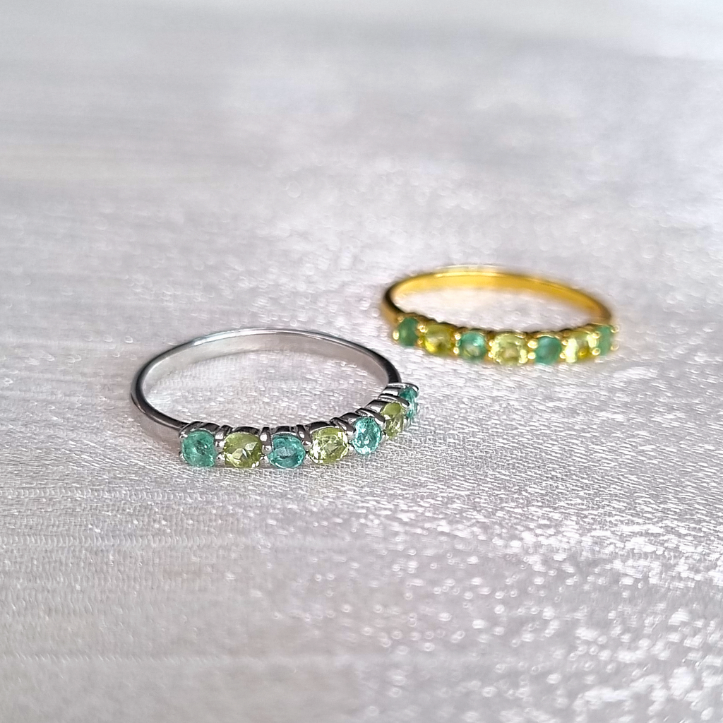 Emerald and peridot half eternity band group image in silver and gold vermeil