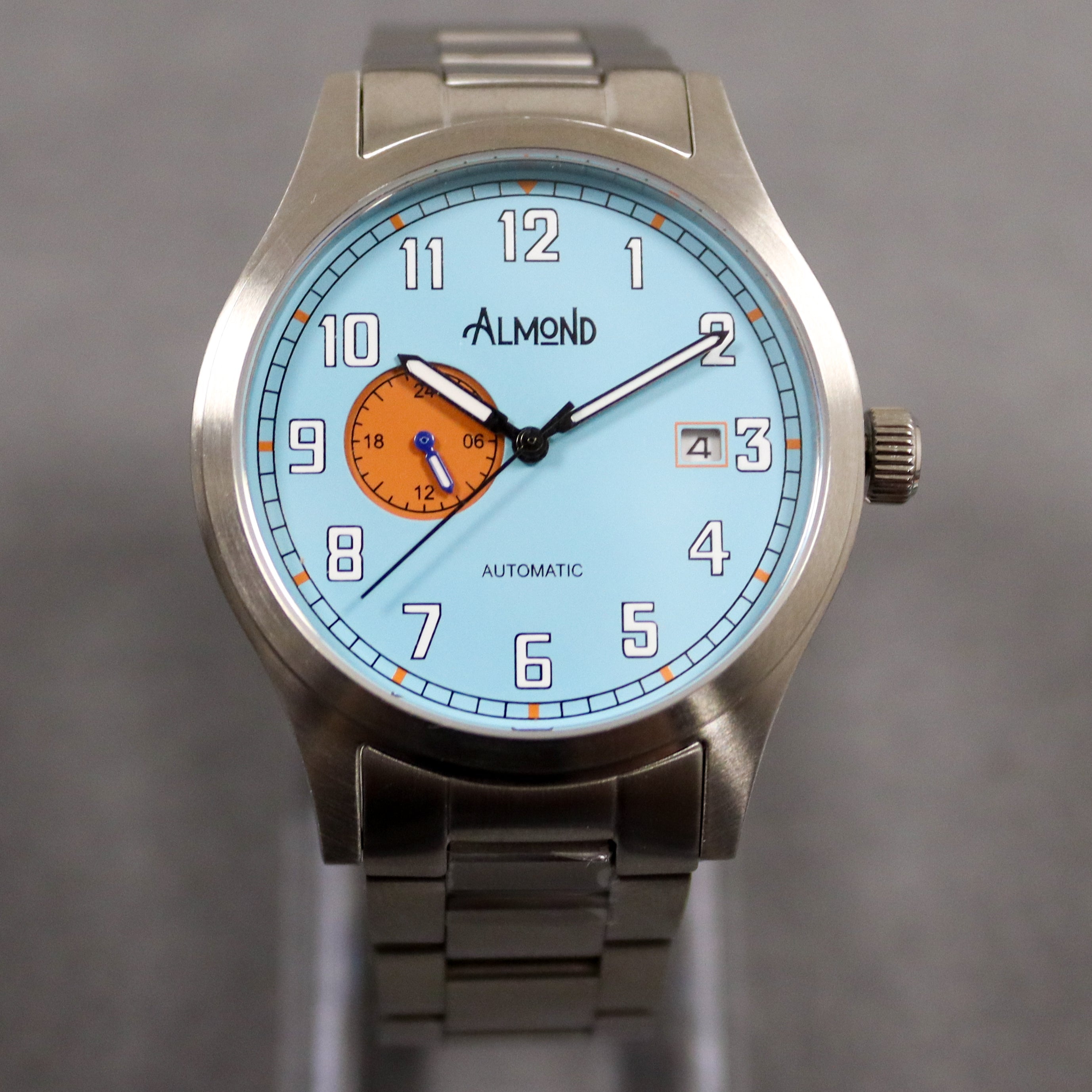 Riley Almond Rifleman Field automatic watch on steel bracelet