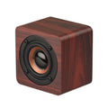 Q1 wooden mini Bluetooth speaker in red with portable design