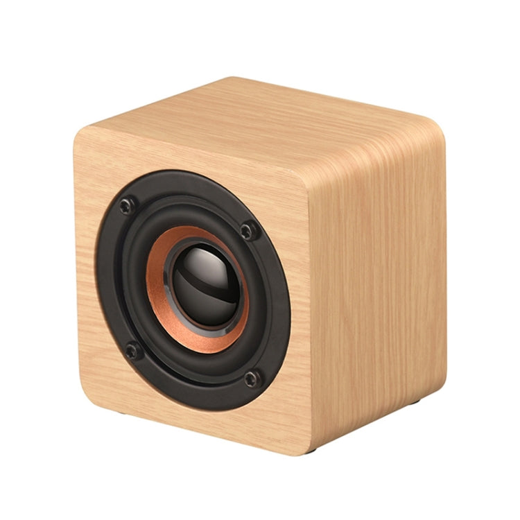Q1 wooden mini Bluetooth speaker in yellow with portable design