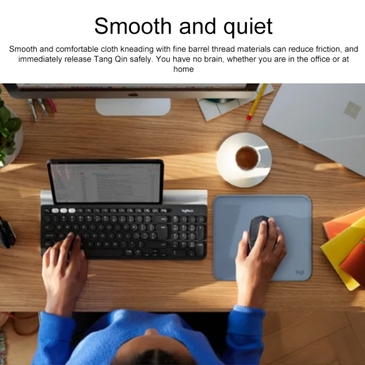 Logitech soft mouse mat detail showing splash-proof coating