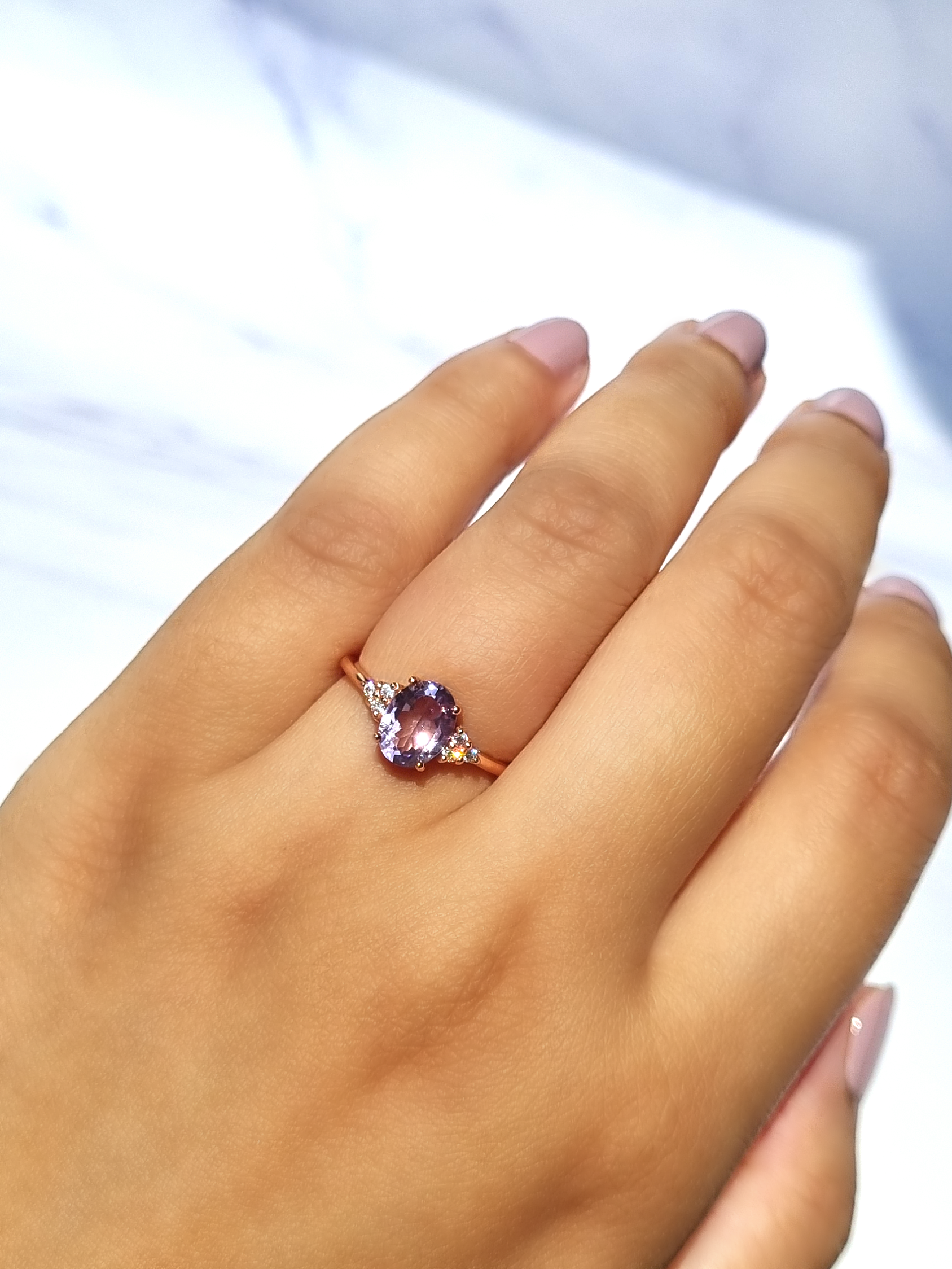 Lavender amethyst ring in 18k rose gold vermeil on hand detail image