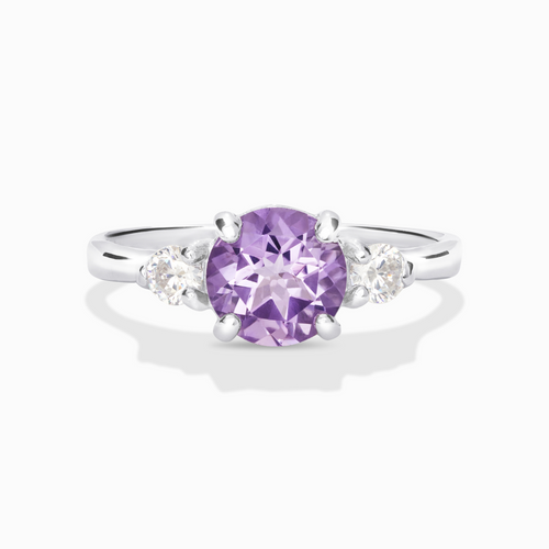 Lavender amethyst three stone ring in sterling silver on white background