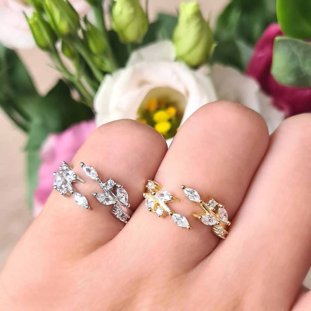Adjustable leaf rings in gold and sterling silver group image