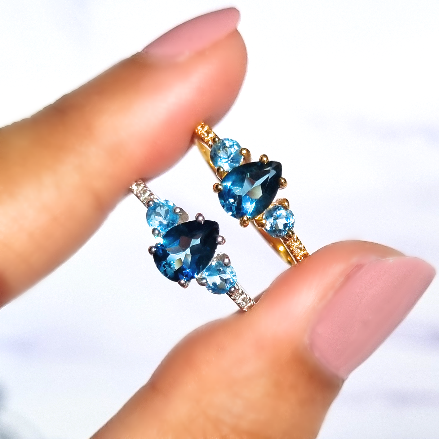 London blue and Swiss blue topaz rings in sterling silver and 18k gold vermeil group image
