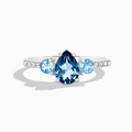 London and Swiss blue topaz ring in sterling silver on white background