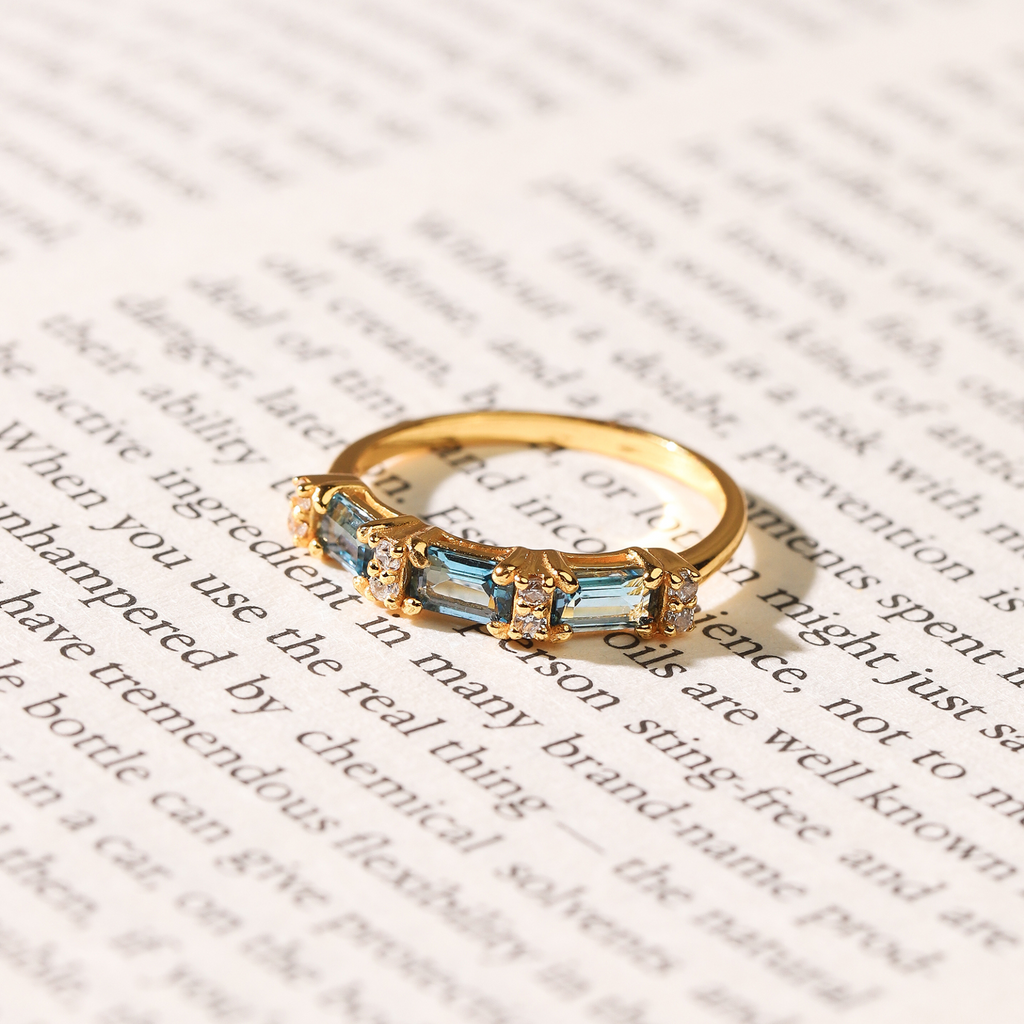 London blue topaz emerald cut eternity ring listed as 18k gold vermeil lifestyle image