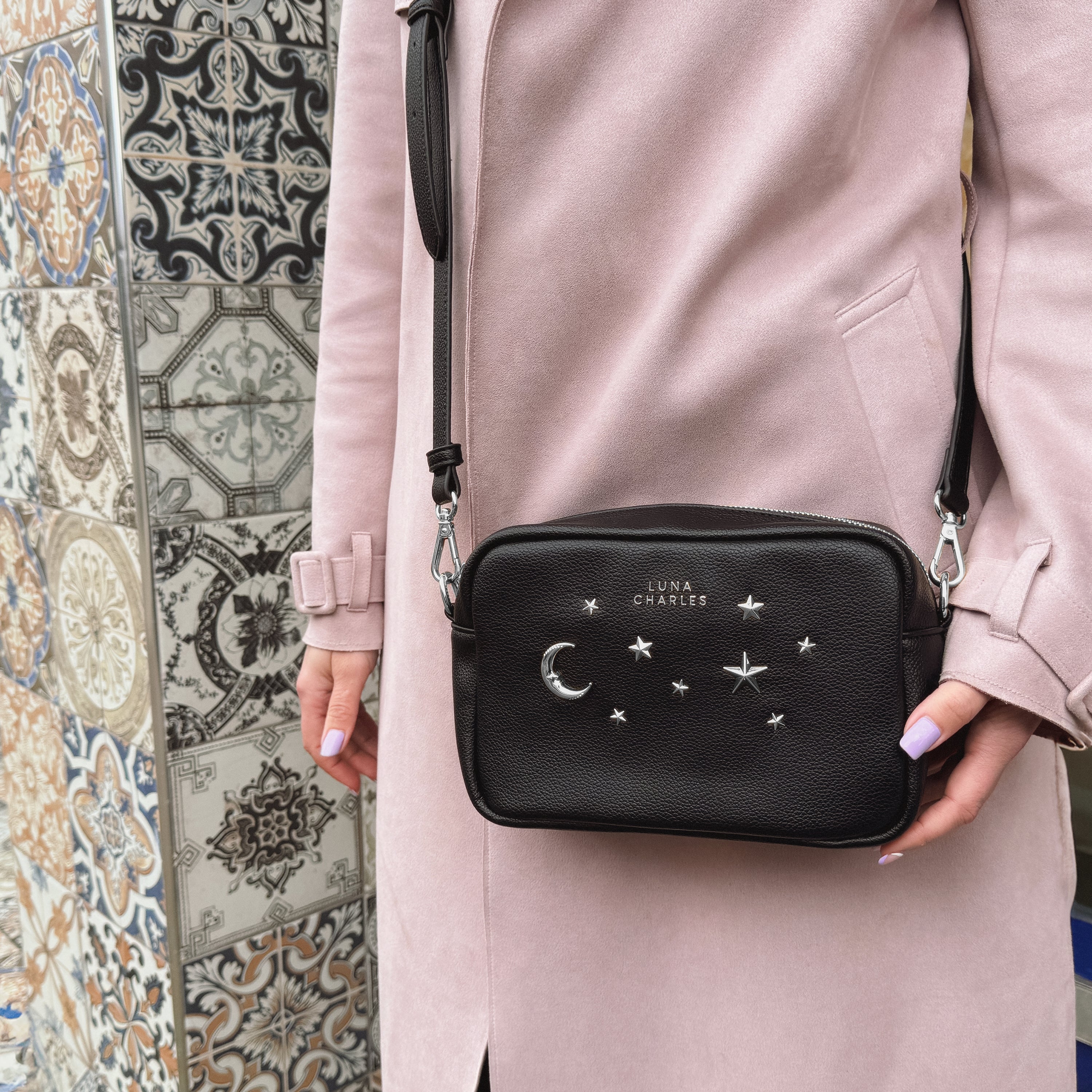 Luna Charles Maya black and silver star studded bag lifestyle image