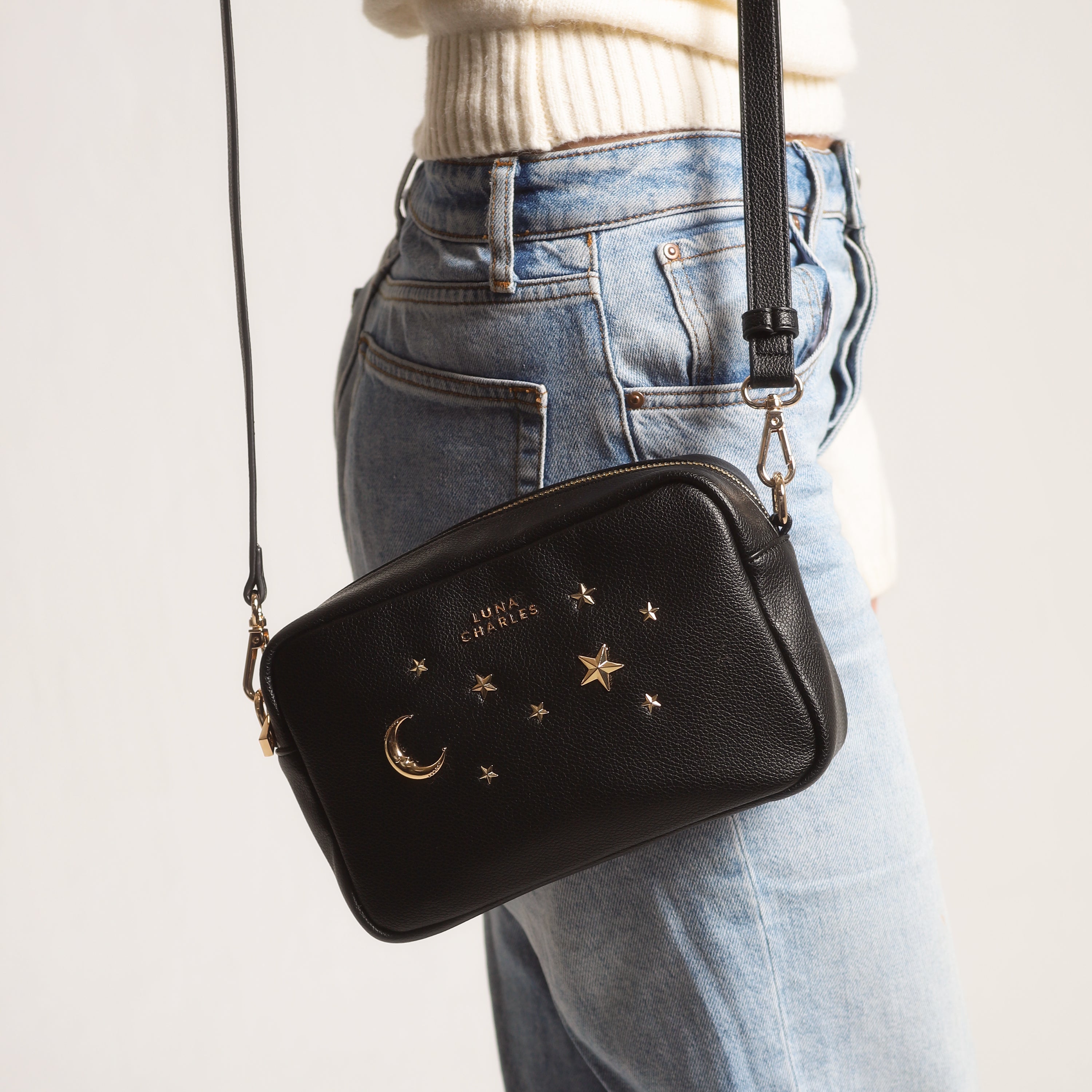 Luna Charles Maya black and gold crossbody bag close-up detail