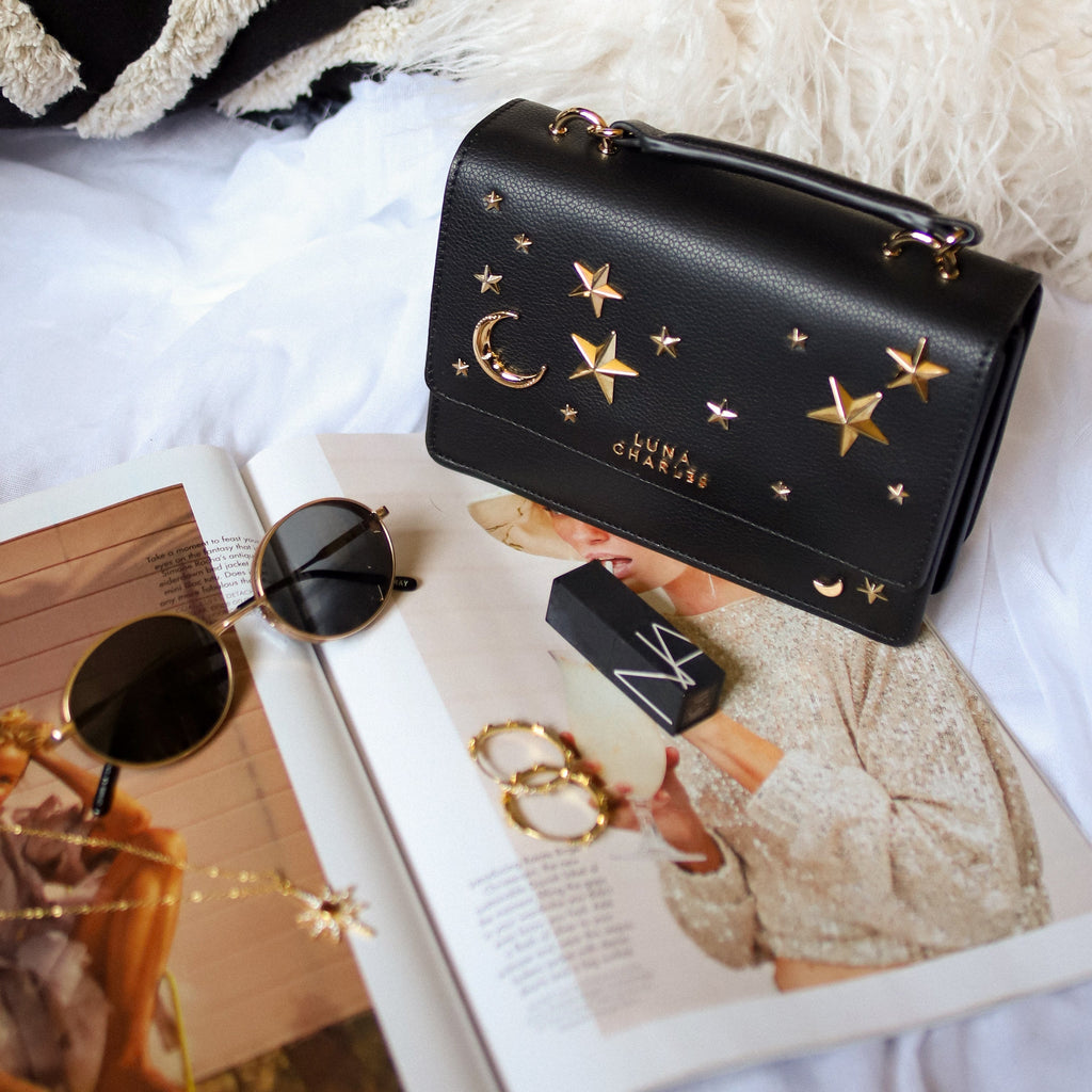 Luna Charles Nova black and gold crossbody bag flat lay detail