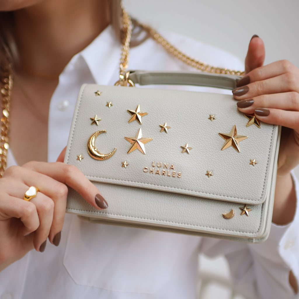 Luna Charles Nova grey and gold crossbody bag close-up detail