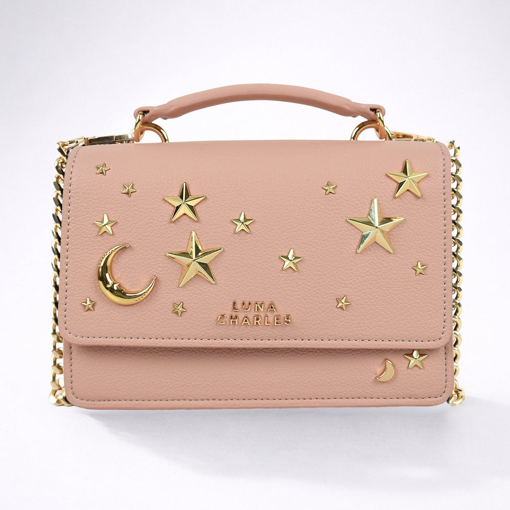 Luna Charles Nova star studded crossbody bag in pink and gold main product image