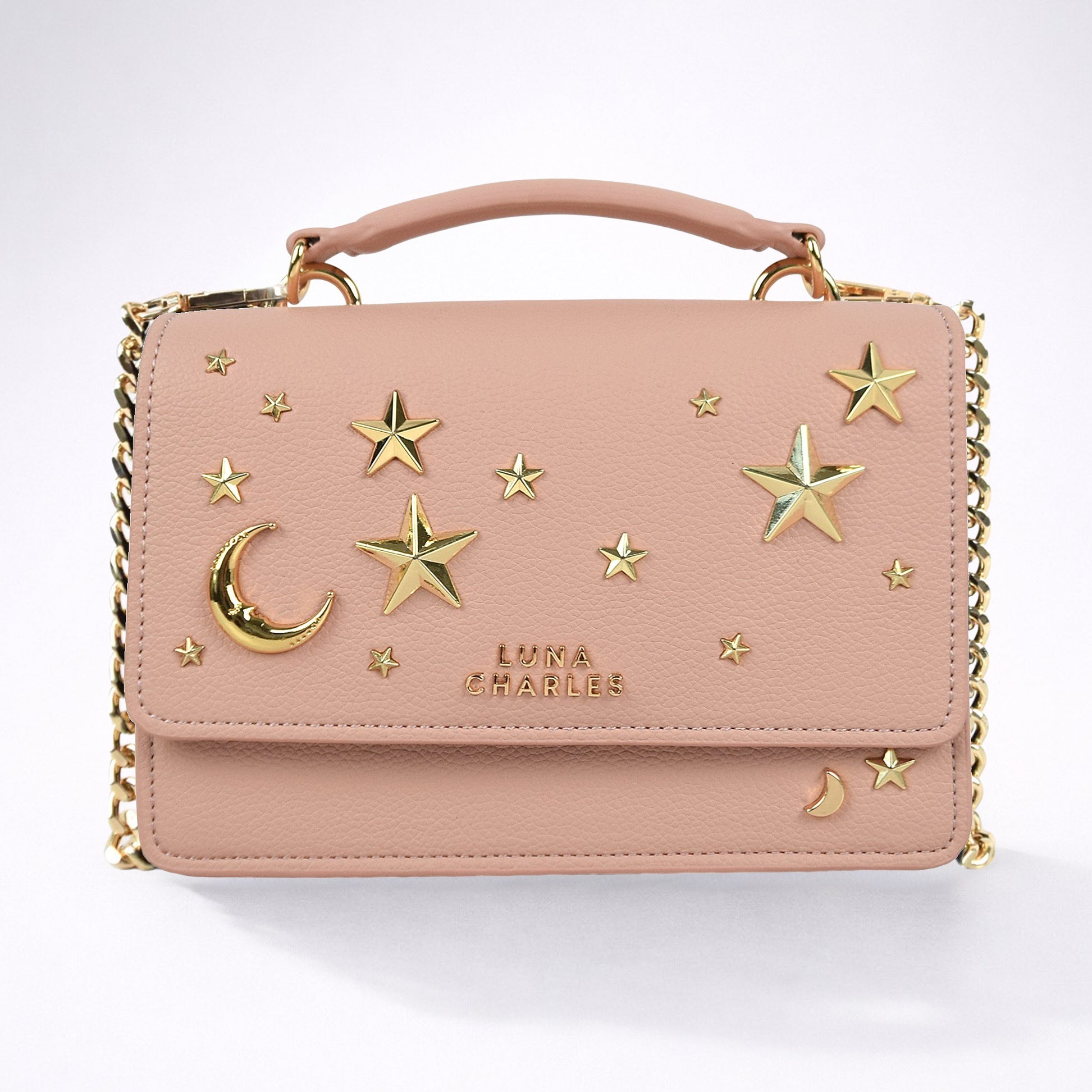 Luna Charles Nova star studded crossbody bag in pink and gold main product image