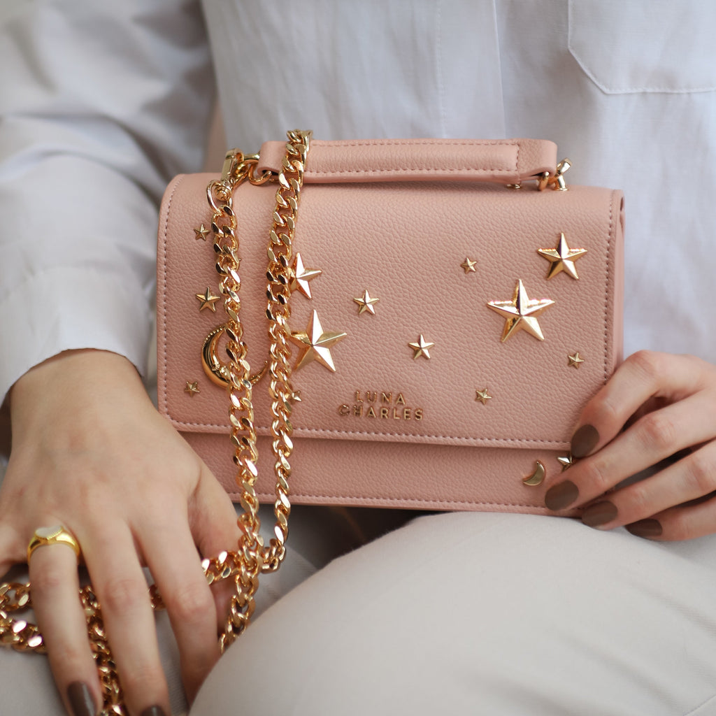 Luna Charles Nova pink and gold crossbody bag close-up detail