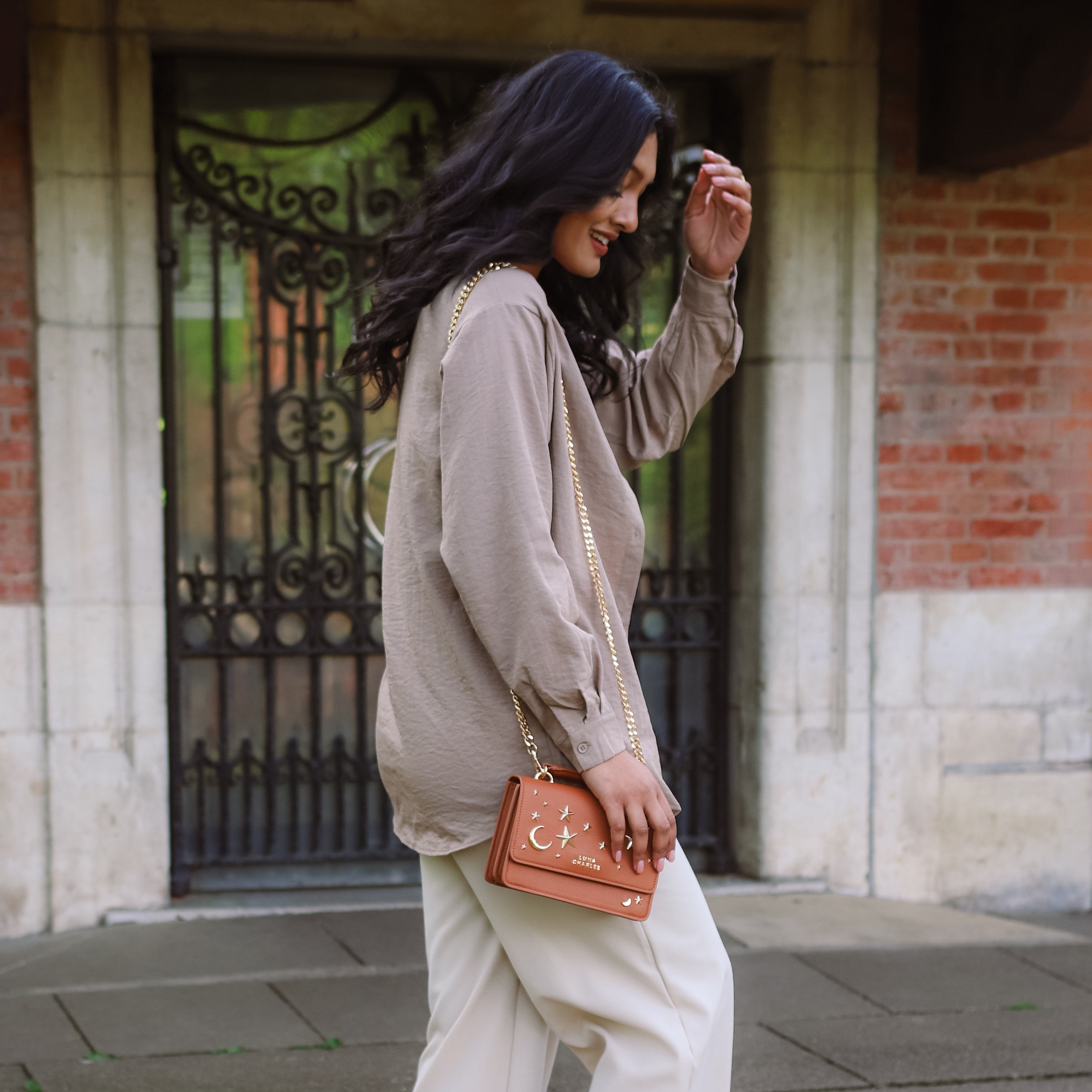 Luna Charles Nova tan and gold crossbody bag lifestyle product image