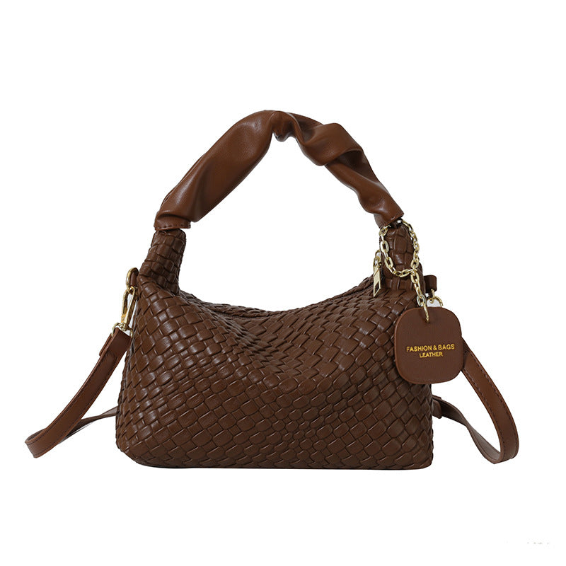 Kenike women's messenger bag strap and flap detail
