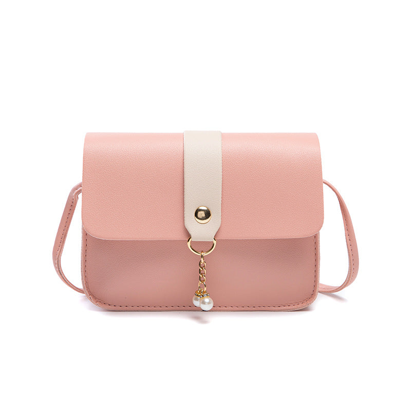 Kenike contrast pearl pendant bag side profile