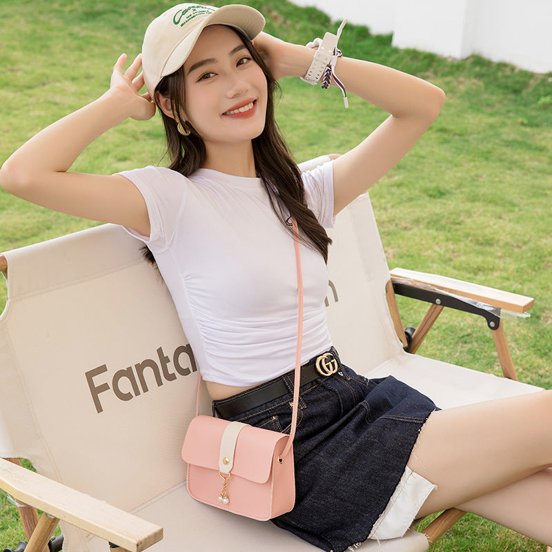Kenike small square bag with pearl pendant front view