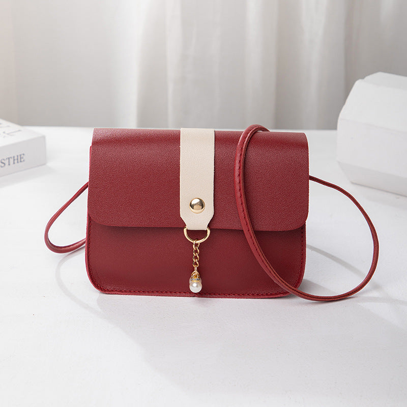Kenike wine red contrast pearl pendant small square bag variant