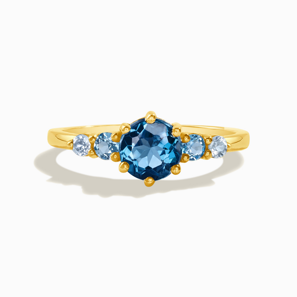 Ombre blue topaz five stone ring in 18k gold vermeil on white background