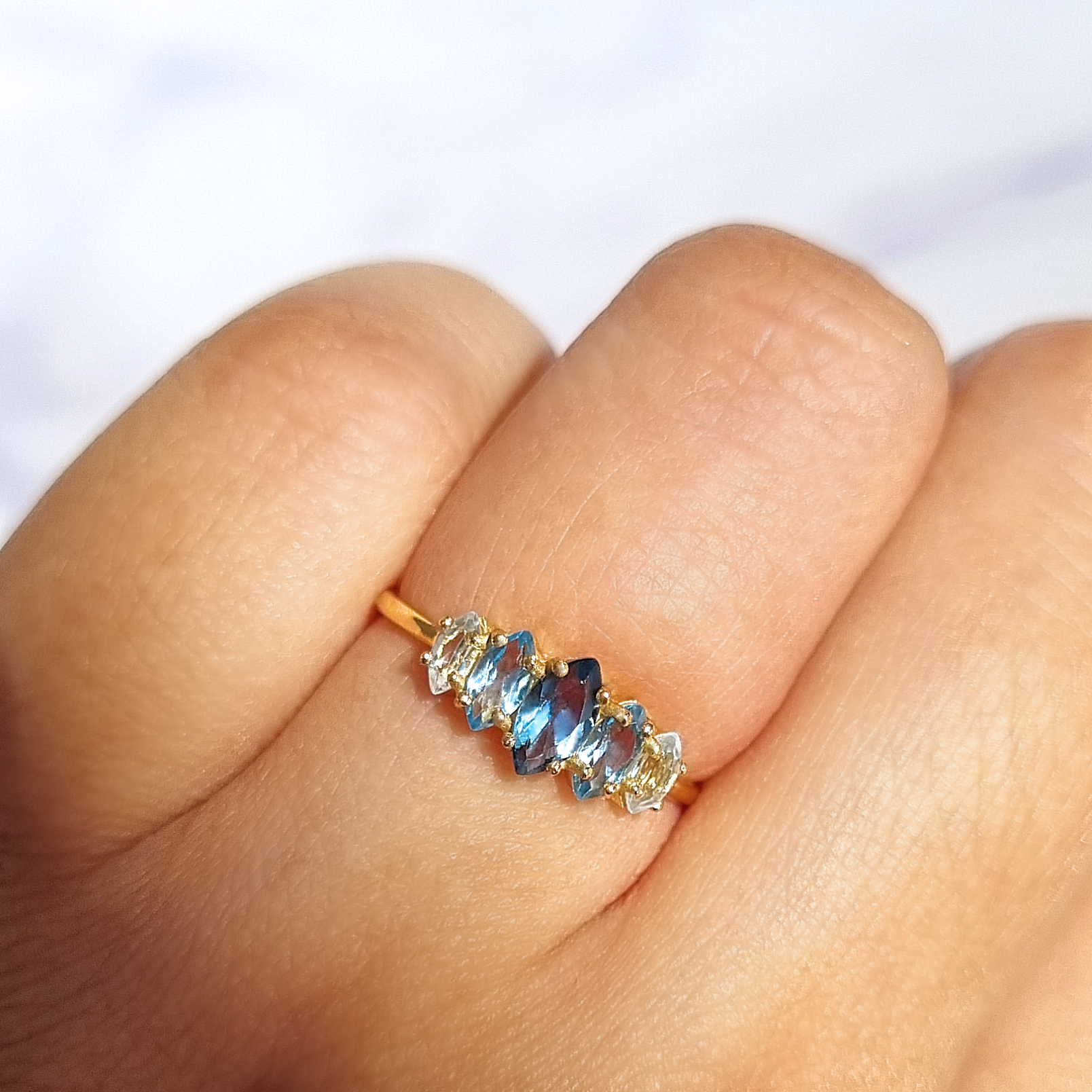 Ombre blue topaz ring in 18k gold vermeil on hand