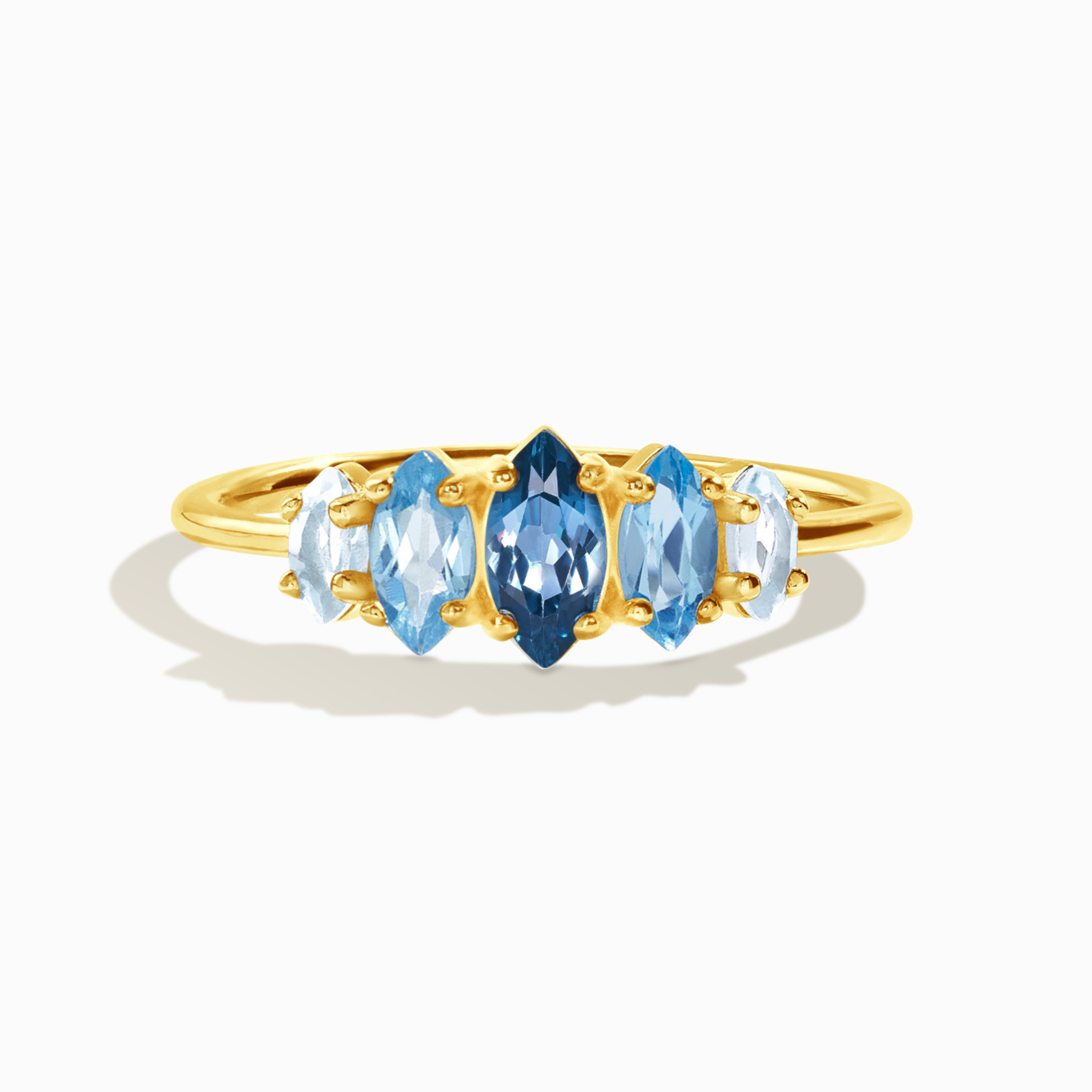 Ombre blue topaz ring in 18k gold vermeil on white background