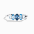Ombre blue topaz ring in sterling silver on white background