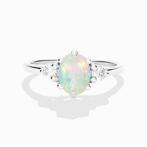 Opal ring in sterling silver on white background