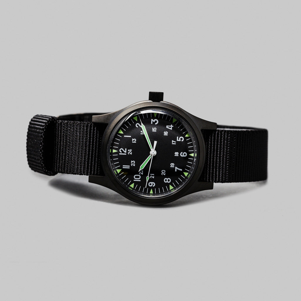 Rotate North Terrain Black Cat.4 Field Watch side profile