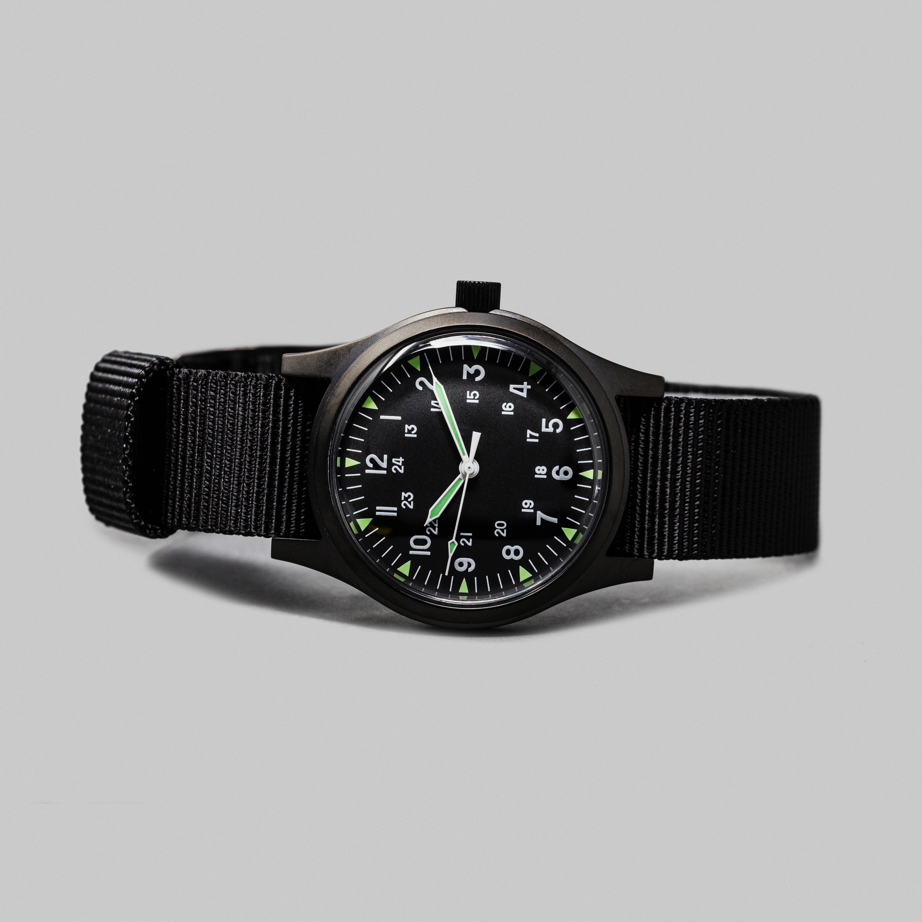 Rotate North Terrain Black Cat.4 Field Watch side profile