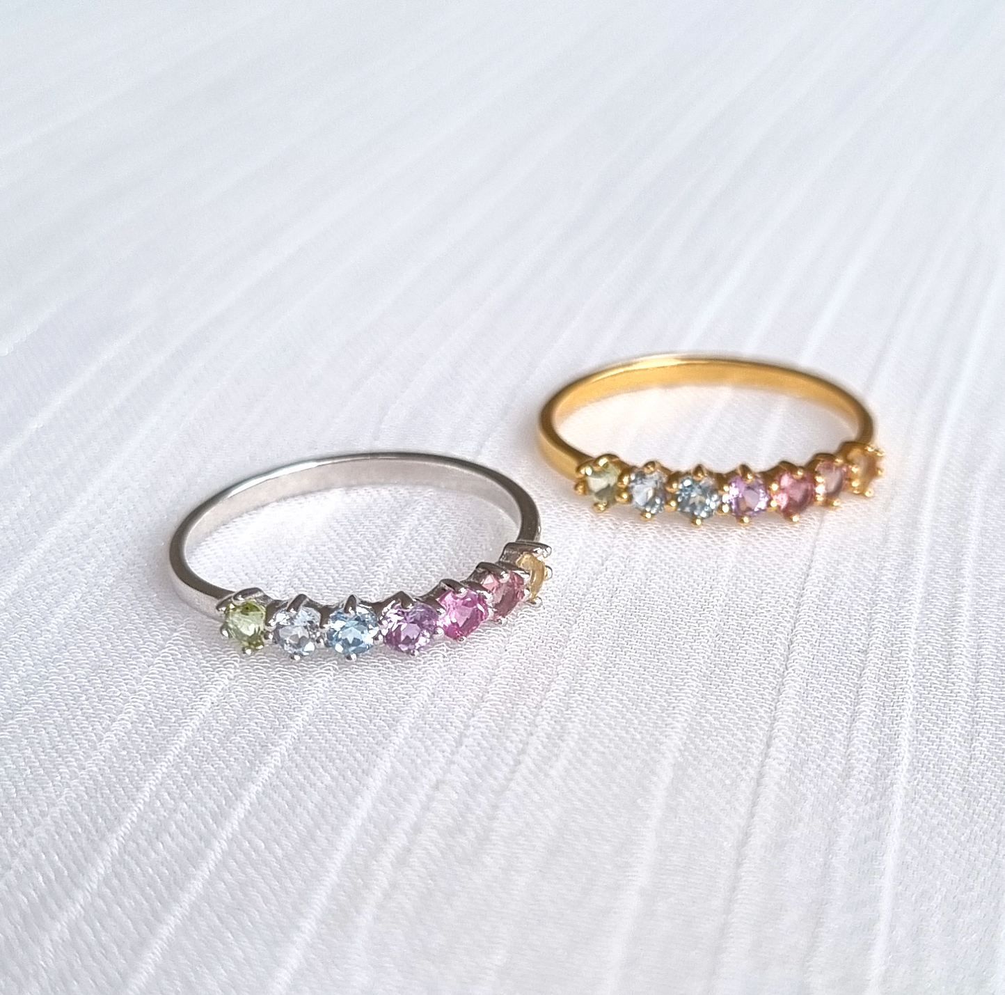 Pastel rainbow gemstone rings in sterling silver group image