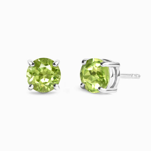 Peridot round stud earrings in sterling silver on white background