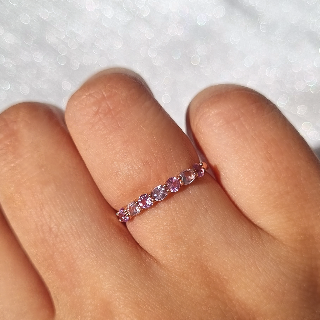 Pink sapphire and pink amethyst half eternity band in 18k rose gold vermeil on hand