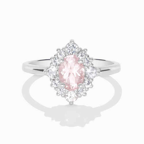 Pink morganite halo ring in sterling silver on white background